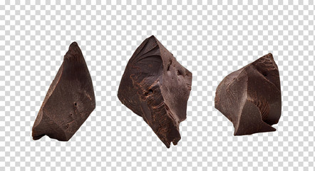 Cracked chocolates / broken chocolate chips or chocolate parts top view on isolated background...