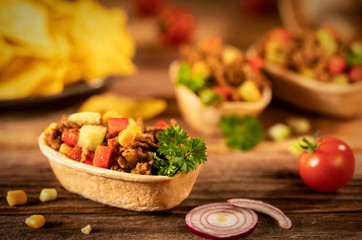 Mexican tacos on a wooden table