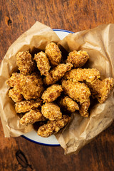 Breaded fried chicken strips.
