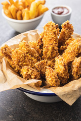 Breaded fried chicken strips.