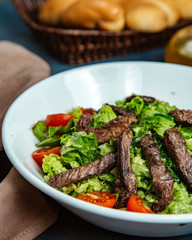 vegetable salad with pieces of meat