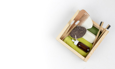 kit of eco cosmetics bath tools. Soap, bamboo toothbrush, natural brush, towel. Zero waste, Plastic free. Sustainable lifestyle concept. copy space