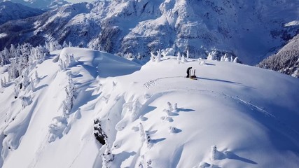 Skier getting ready to go down in the backcountry