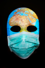 Textured mask with the map of Africa wearing surgical mask. Concept for corona virus pandemia.