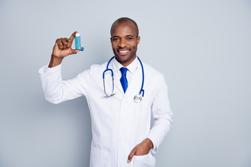 Photo of family doc dark skin guy hold inhaler asthma attack advising medical prescription against self-treatment concept wear stethoscope lab coat isolated grey color background - obrazy, fototapety, plakaty