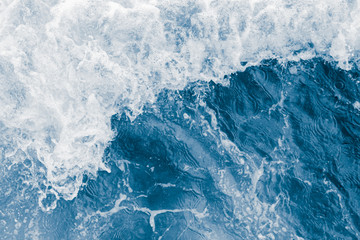 Dark blue sea wave and white foam - 336937797