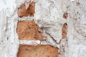 Background of old vintage brick wall with concrete,Ancient walls and walls are damaged.