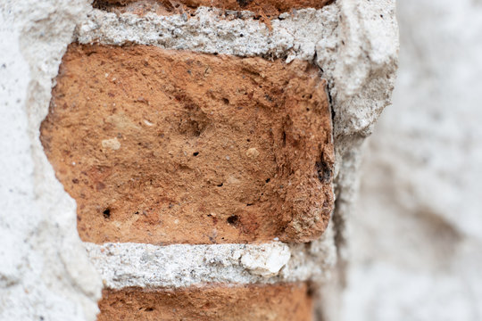 Background of old vintage brick wall with concrete,Ancient walls and walls are damaged.