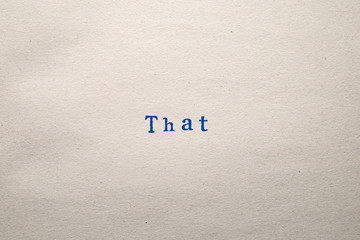 a THAT word stamped on a piece of paper.