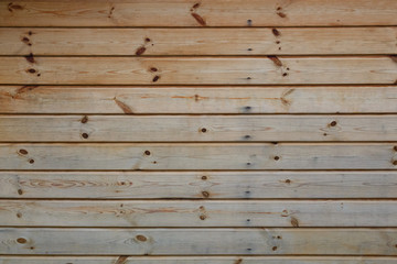 Naklejka premium Wooden Log Cabin Wall Natural Colored Horizontal Background Texture Detail Close Up