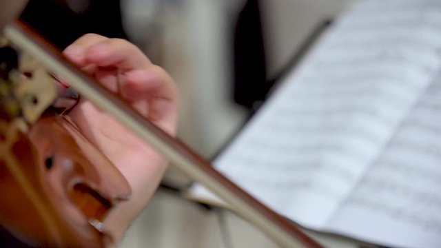 playing the violin close-up of a violinist men