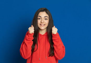 Brunette young girl wearing red jersey