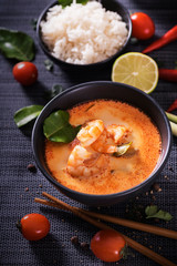 Tom Yum Goong Thai hot spicy soup with Ingredients on dark background