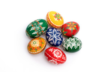 Group of beautiful bright color hand painted Czech Easter eggs isolated on white background