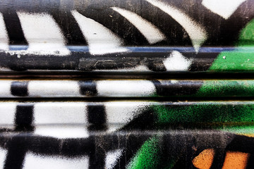 Details of graffitis painted on wall you can use as background for your design