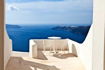Fotobehang santorini island greece, balcony with view © yoemll