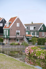 Typical Dutch village scene with wooden houses on the island of Marken in the Netherlands, Holland