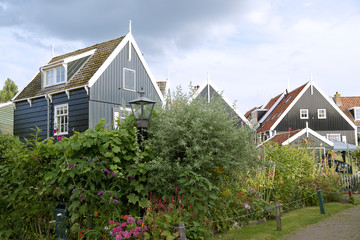 Fototapeta na wymiar Typical Dutch village scene with wooden houses on the island of Marken in the Netherlands, Holland