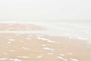 Belgian coast beach on a misty day