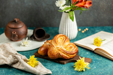 freshly baked buns in the shape of a heart