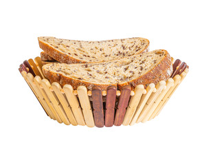 Slices of bread on a decorative plate isolated on white background