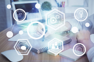 Social network theme hologram over woman's hands writing background. Concept of international people connect. Double exposure