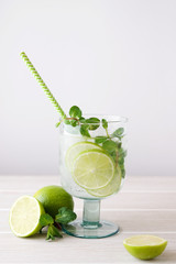 Cold mojito with lime and mint. Refreshing summer drink. Close up view