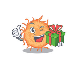 Smiling bacteria endospore cartoon character having a green gift box