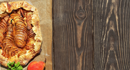 Homemade seasonal French pear cookies - galette with ripe pears, cardamom and honey. A baked...