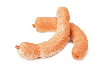 fresh tamarind fruits isolated on white background