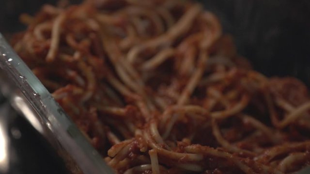 Spaghetti Pasta Inside The  Small Transparent Container. -close up shot