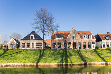 Fototapeta na wymiar Historic houses at the canal of Steenwijk, Netherlands