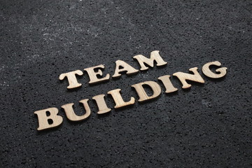 Team Building, business motivational inspirational quotes, wooden words typography lettering concept