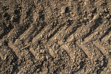 Texture of tractor tracks in dry soil