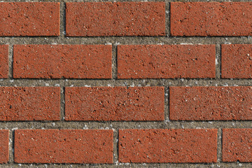 Texture of red bricks and cement