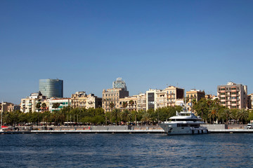 Fototapeta na wymiar View of big, white luxury yacht at marina called 