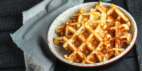 Belgian or american waffles (delicious sweet dish, dessert snack) menu concept. background. top view. copy space for text