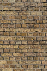 Texture of yellow and sand colored bricks