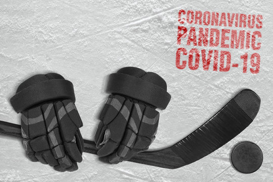 Hockey accessories lying on the ice arena