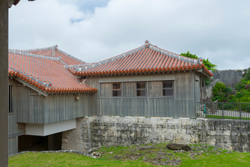 Fototapeta na wymiar Stucco Roof and rampart of Shurijo castle, Okinawa