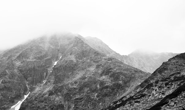 Black and white photo of a mountain peak