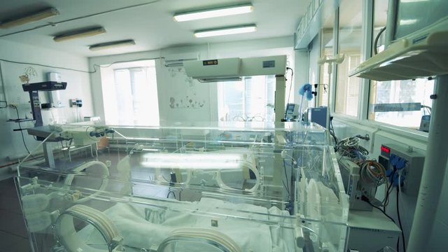 Labour ward with an empty incubator for babies