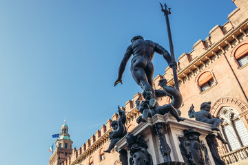 Naklejka premium Statue of Neptune, part of large fountain located on main square in historic part of Bologna city, Italy