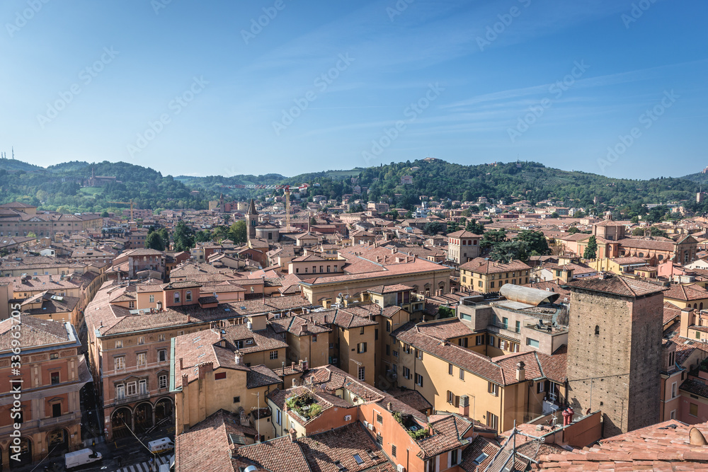 Sticker Historic part of Bologna city, Italy - view from terrace of St Petronius Basilica with Galluzzi Tower on right side