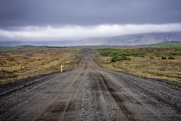 Empty gravel road 264 near famous Keldur farm in southern Iceland