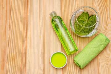 Personal care at home. Gel and tonic water with green tea, bath towel. Natural ingredient spa...
