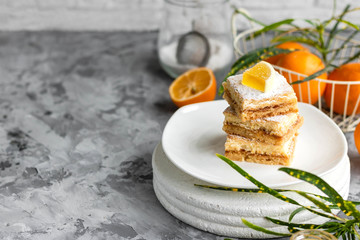 Lemon bars on a shortcrust pastry. A simple dessert for the summer