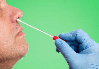 Doctor makes a nasal swab test