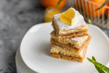 Lemon bars on a shortcrust pastry. A simple dessert for the summer