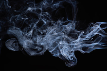 white flowing smoke cloud on black background